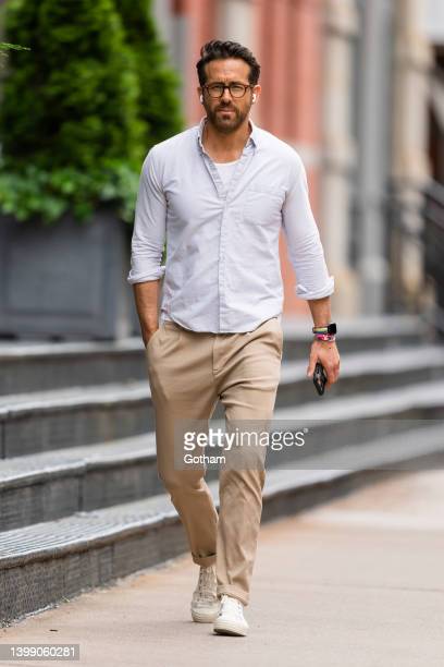Ryan Reynolds wearing chino pants on the street